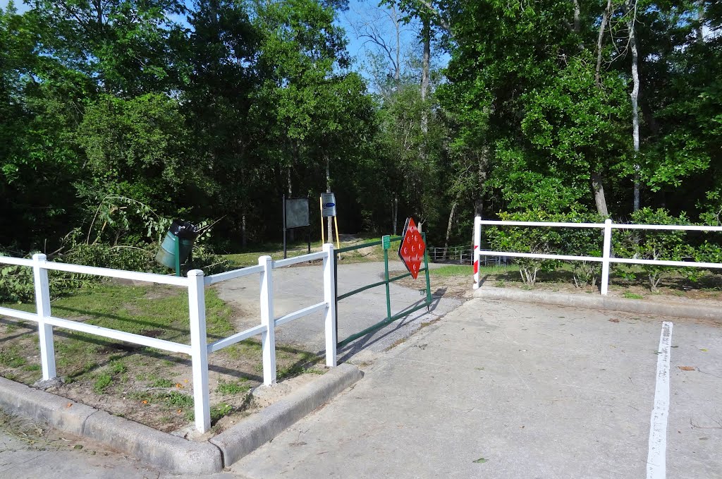 Access to paved trail and mountain biking trails in the woods by WOLFGANG HOUSTON WEST