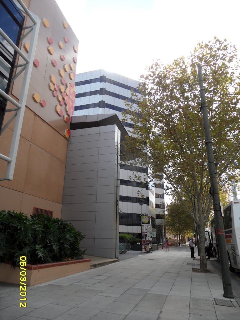 Adelaide Convention Centre on left and Riverside Centre along Footpath along North Terrace in ADELAIDE, on 5-03-2012 by Peter John Tate,