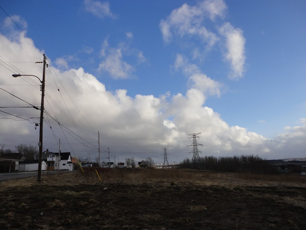 Clouds up in the Sky on St. Ann's St. by Frankie MacDonald