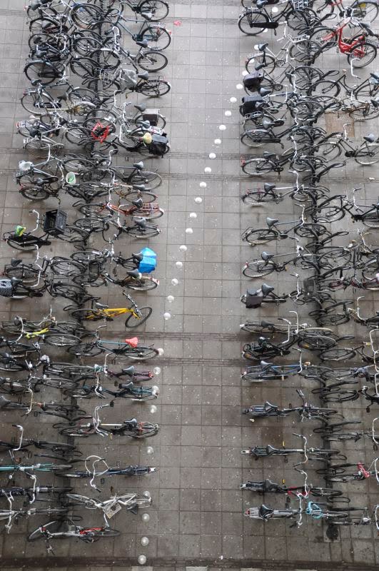 Bicycles at the train station of Duivendrecht by Pixelator