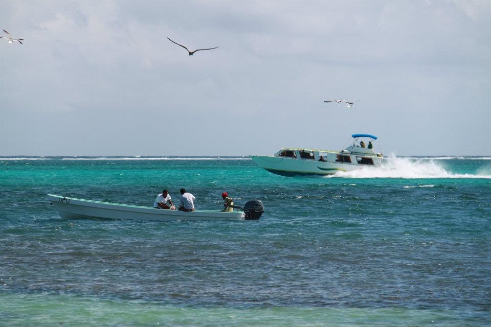 Unnamed Road, San Pedro, Belize by Alex Bogomaz