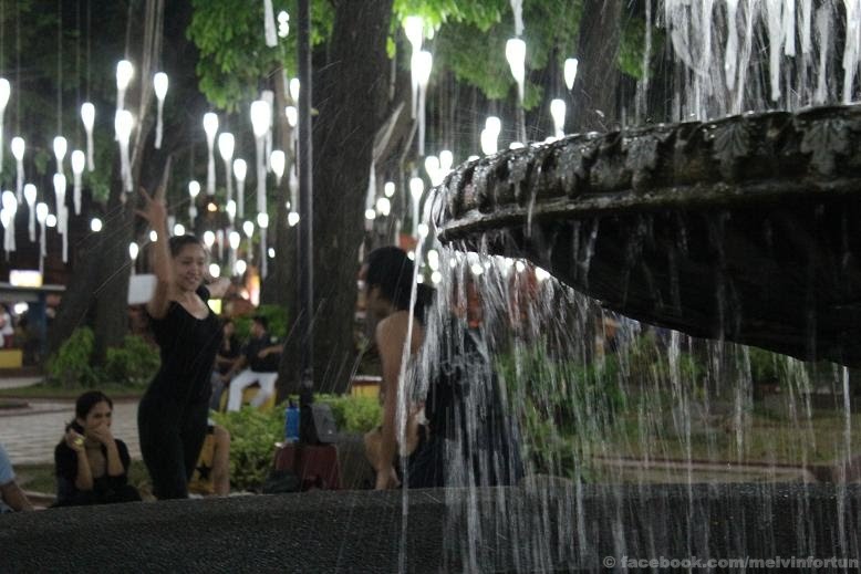 Dancing Around The Fountain by Melvin Fortun