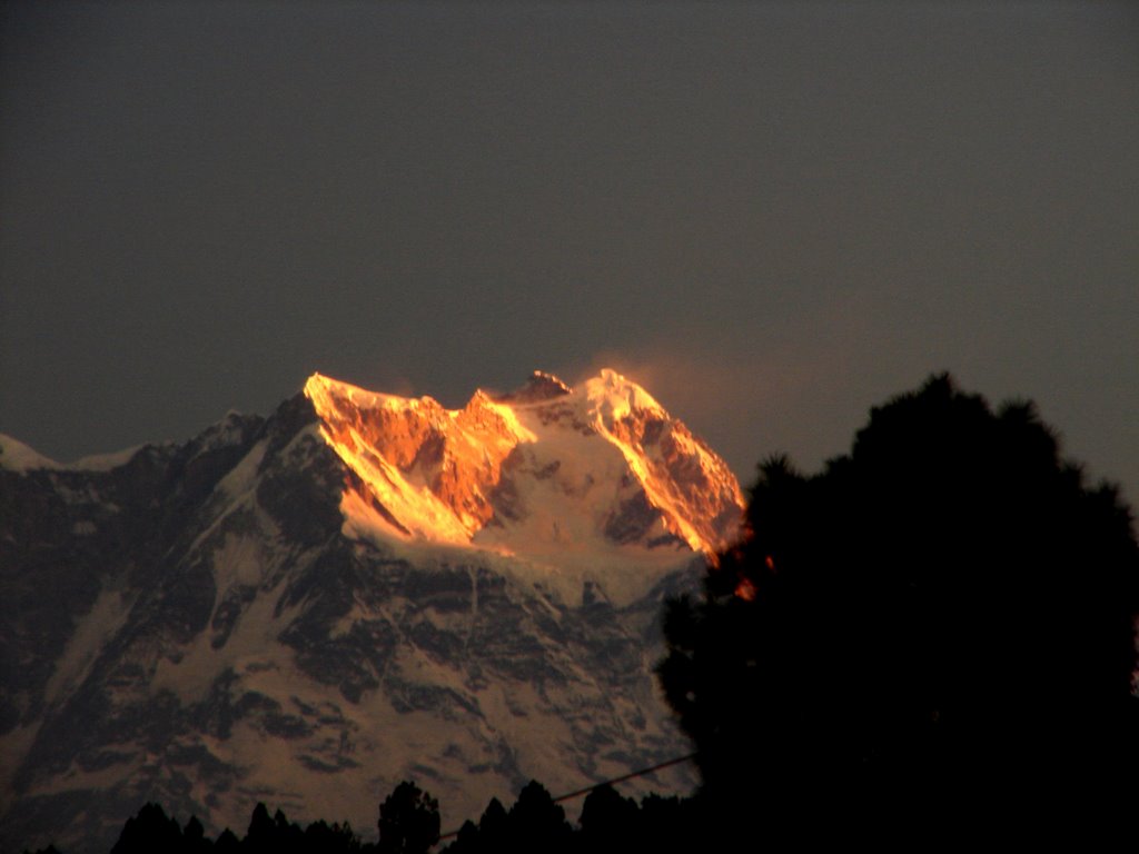 First rays of Sun on Chowkhamba peaks - Khirsu by ANINDYA PAL