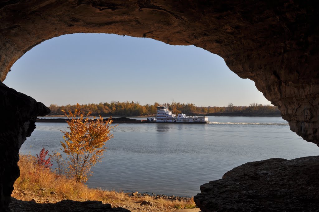 River boat, mouth of cave by norm cline