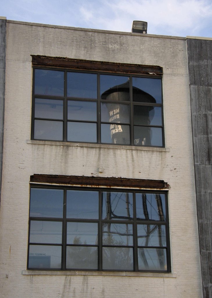 Water tower reflection by Marilyn Whiteley