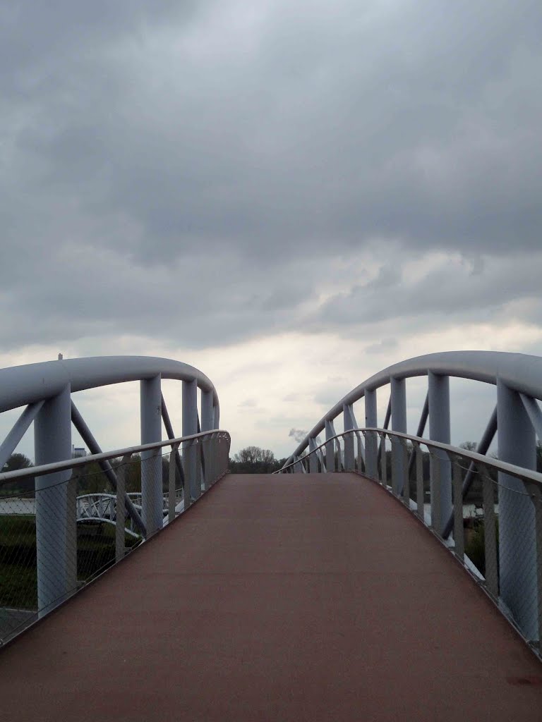 Cloudy skyline bridge by Ulrich Martini