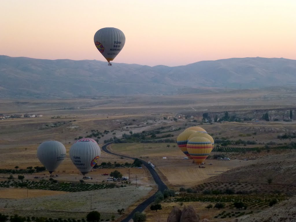 Balloons getting ready. Goreme, Cappadocia by Vaso Lampiri