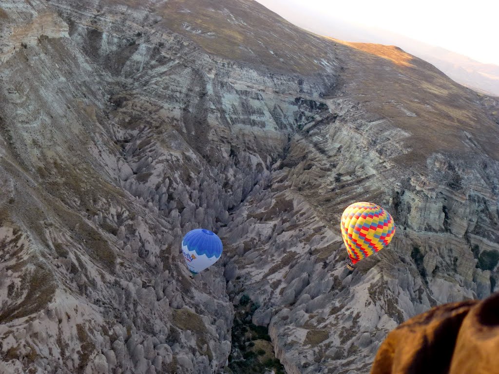 Balloons flying over Cappadocia by Vaso Lampiri