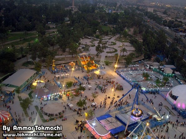 In The Top Of Baghdad's Wheel by Ammar Al-Tokmachi