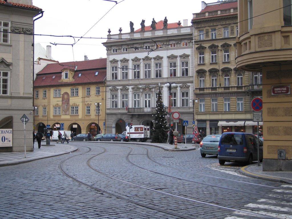 A winding road through the city centre of Prague by escapis