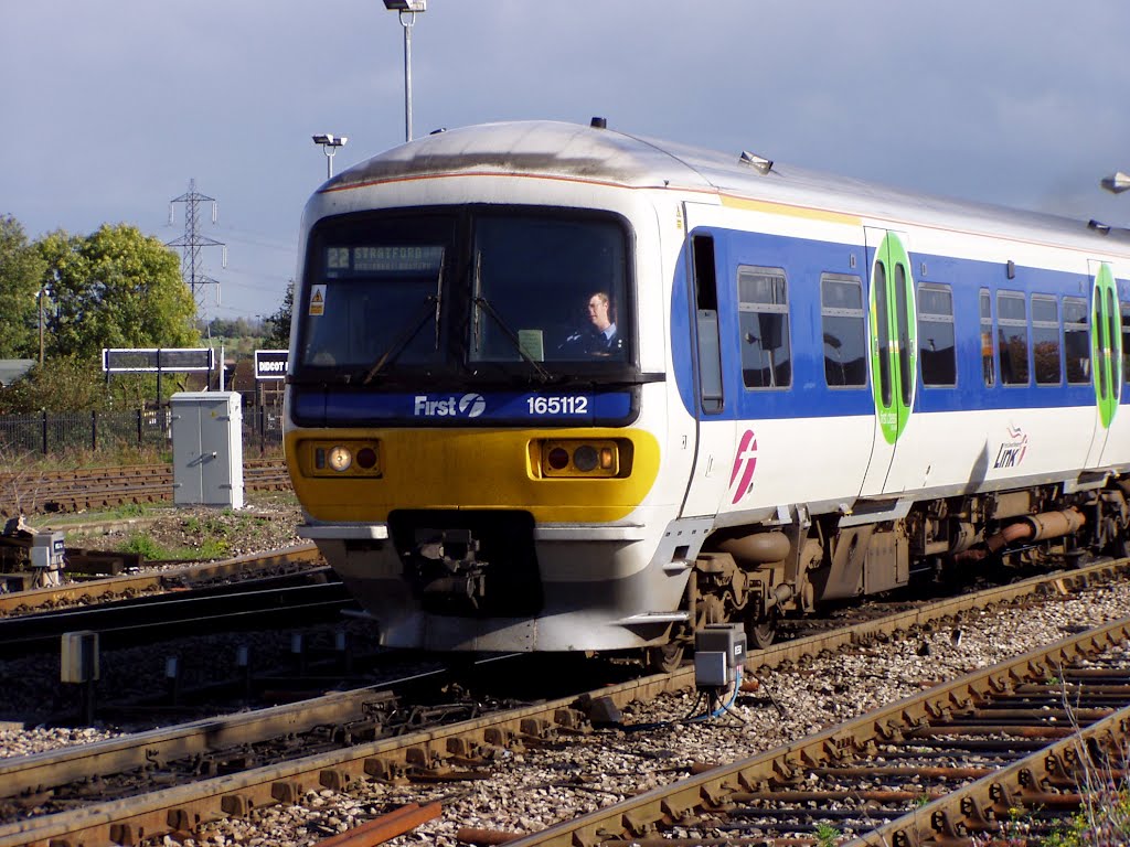 Class 165 112 DMU Photo, in 'First' livery, approaching Didcot station, Oxfordshire, England by Charles Moorhen