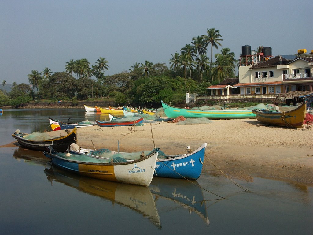 Boats in Baga Estuary by Vojta Srejber