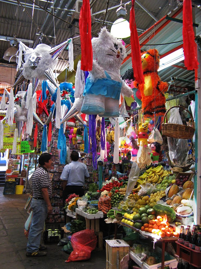 Piñatas in the market of Tlalpan by Eva Lewitus