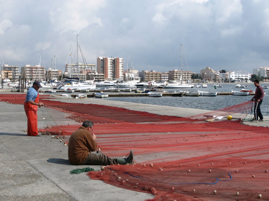 Fishermen mending nets. Lo Pagán, Spain by Helvi H.