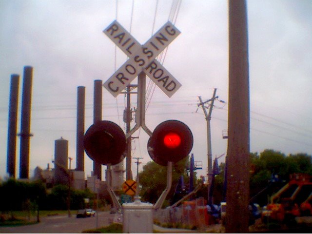 Rail Crossing near Stone Arch Bridge 2004 by Ray Rolfe