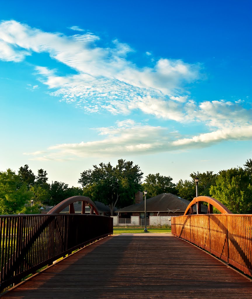 A wooden bridge on Sikes Lake by RENCO