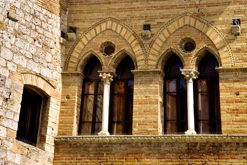 Facade on main plaza, San Gimingnano by Frits Visser