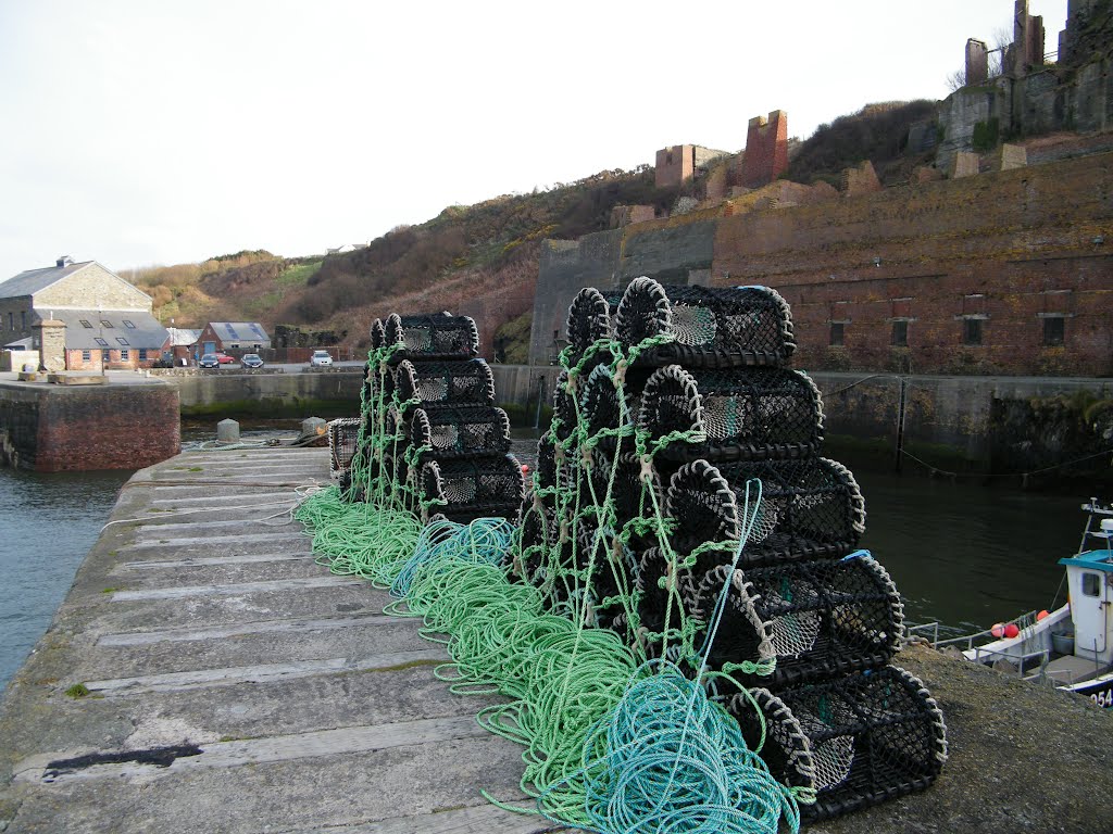 Stacked pots on the quay wall by SeanPhillipsPhotography