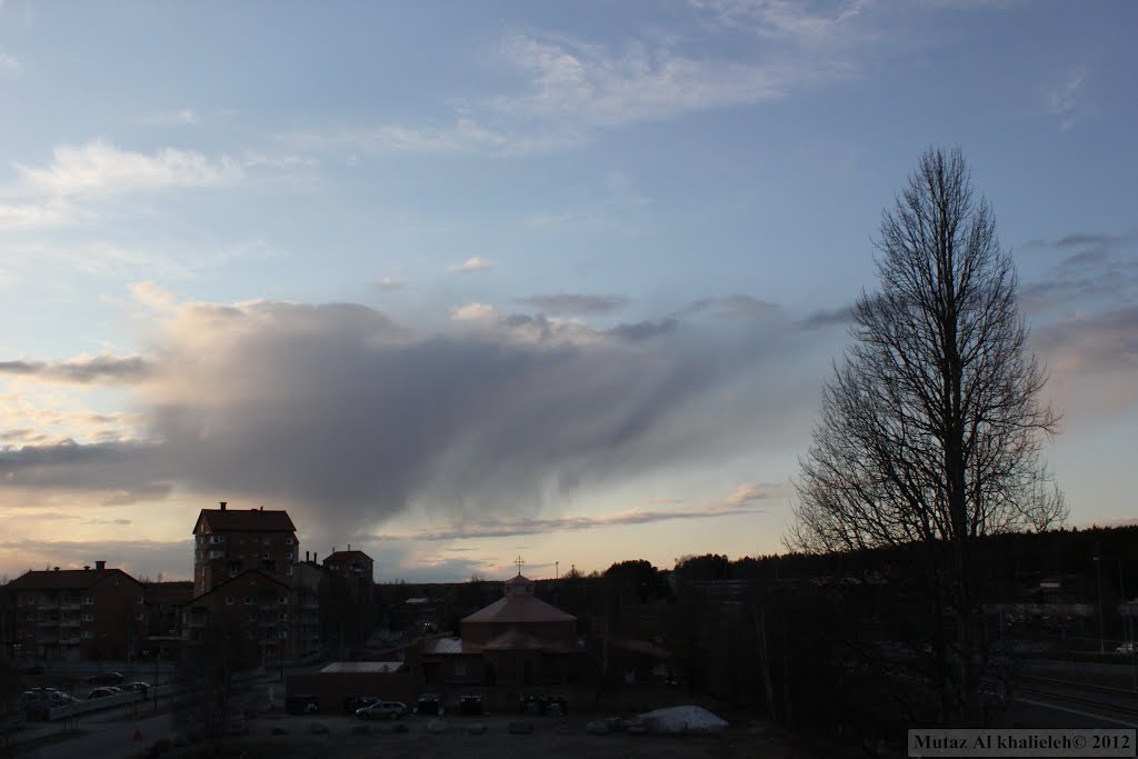 Rain tails in Umeå by Mutaz Khalieleh