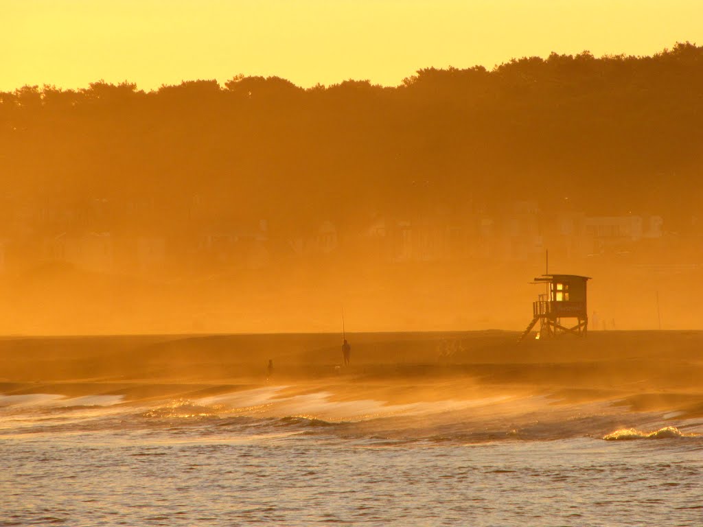 Sunset at Manantiales beach by okta!