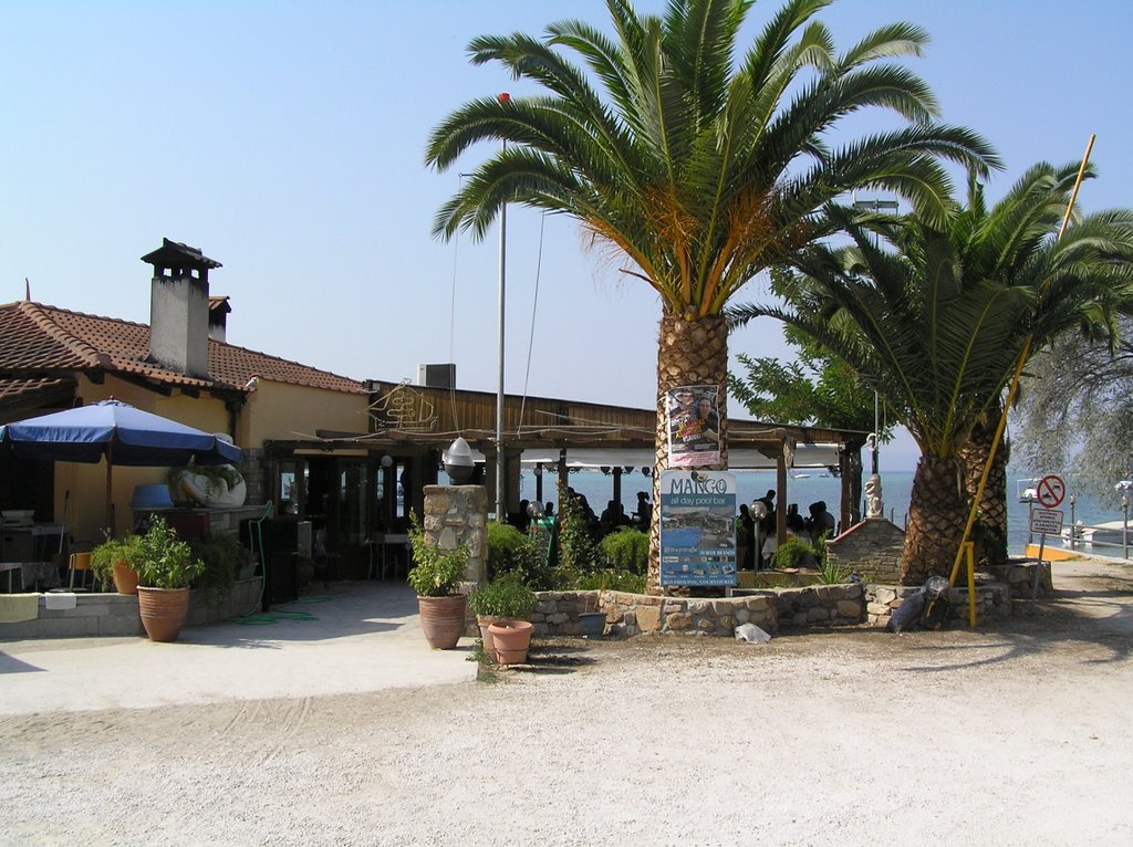 Tavern in Vourvourou by Yuri Filkin