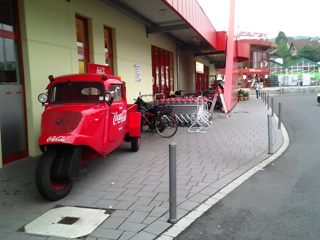 A German Quality Product: Goliath tricycle from the postwar years. Photographed in Overath, Hit supermarket, May 2012. Goliath Dreirad, abgelichtet in Overath, Hit Markt, Mai 2012 by © "Earth Views"