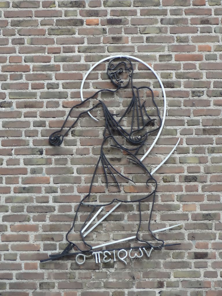 Gable sculpture at the wall of the Roman catholic parish center by Willem Nabuurs