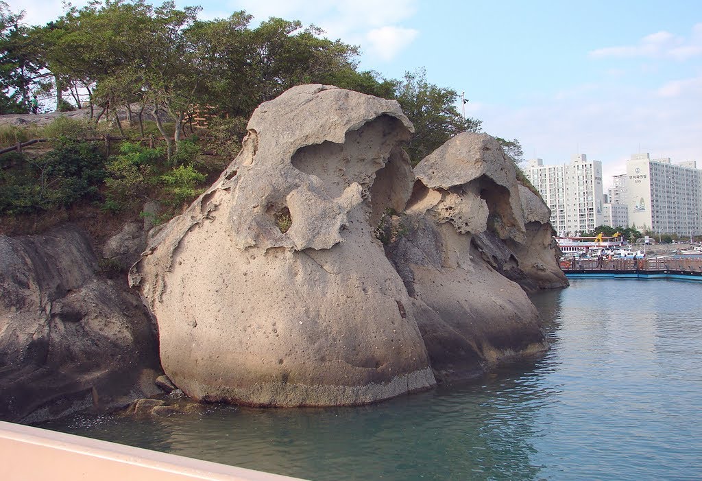 The rock formations in Mokpo are a type of Sandstone Tafoni and are call "Gatbawi" which means "Hat Rock". by §teve