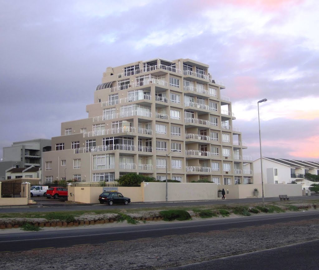 Flats on sea front by Charles Vrey