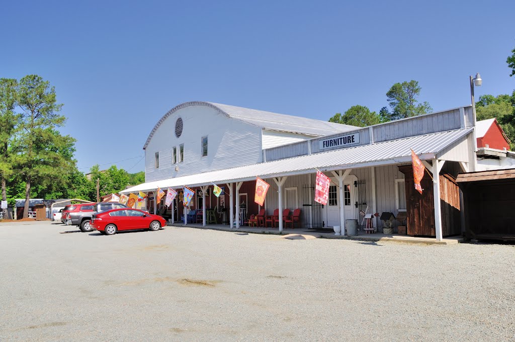 VIRGINIA: GLOUCESTER: Crutchman at the Gloucester Emporium (originally a country store, then a roller skate rink and bowling alley, then an antiques store, now a truck accessories dealer) eastern aspect by Douglas W. Reynolds, Jr.