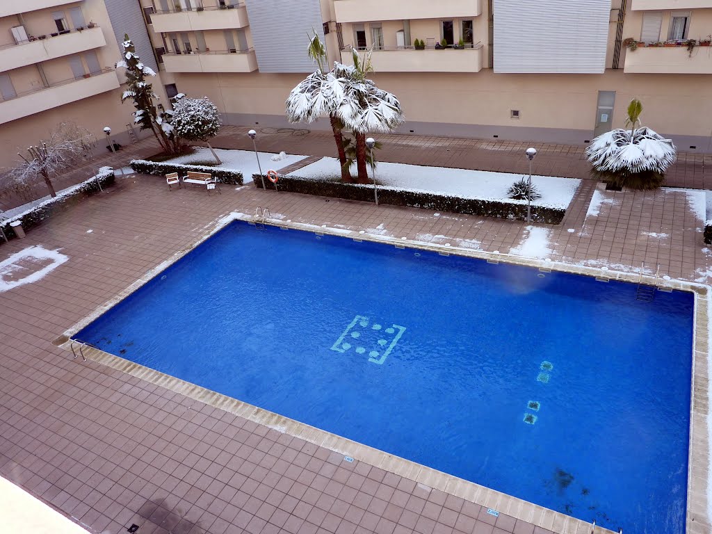 My swimming pool with snow by spiritualizedkaos