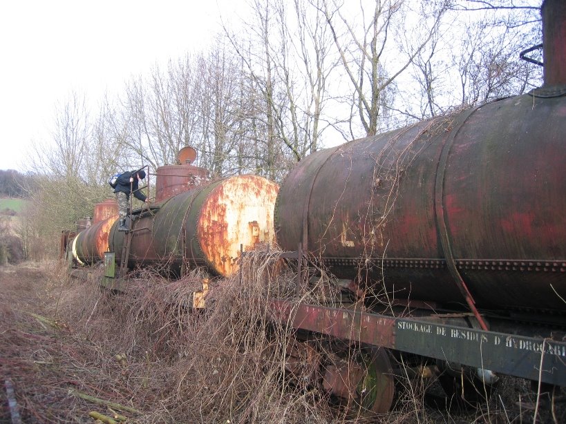 Abandoned railway carriages by Erik B.