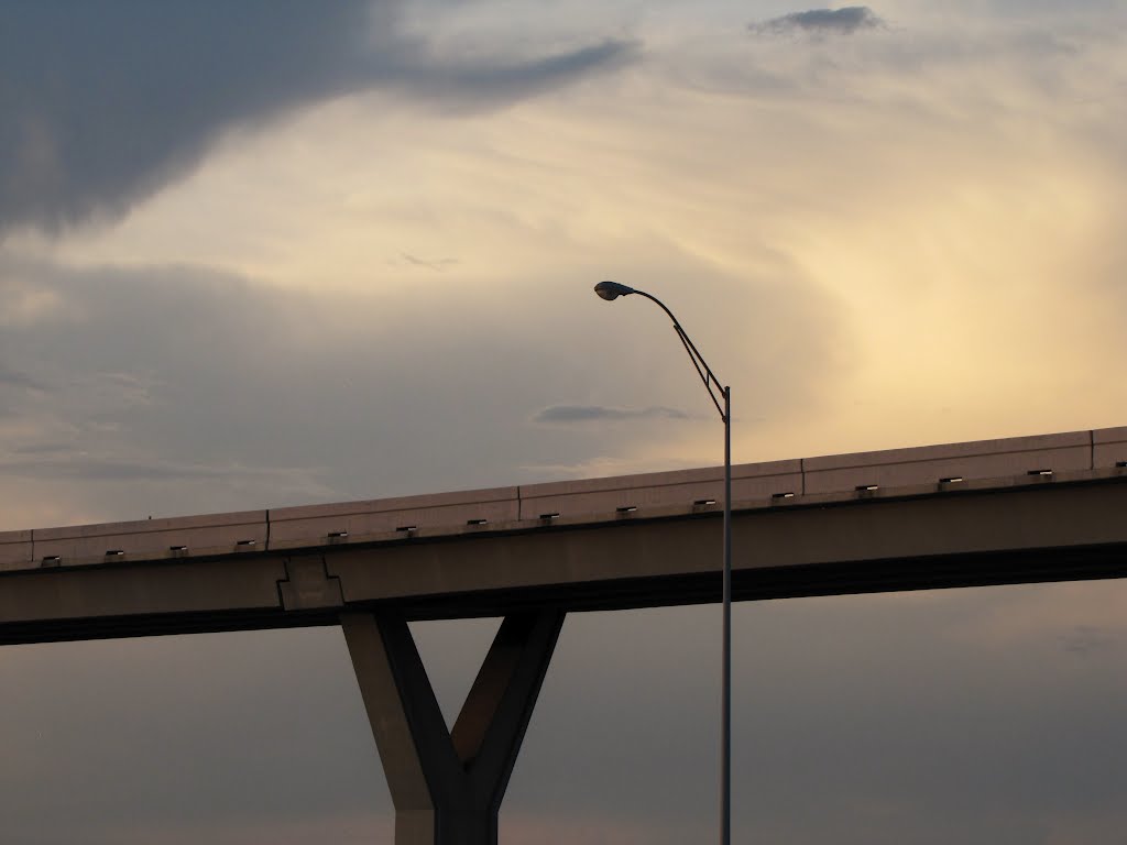 Freeway minimalism with evening sky by Wolfgang Houston