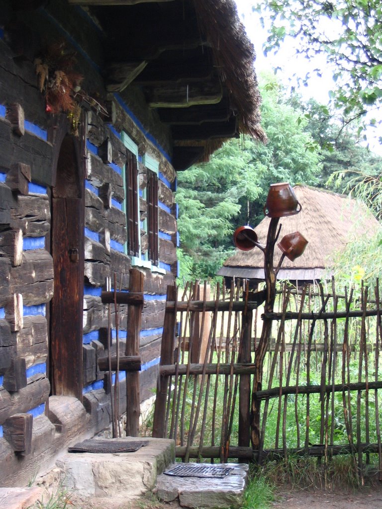 Earthenware on a fence - heritage park by Artur de Sousa Rocha