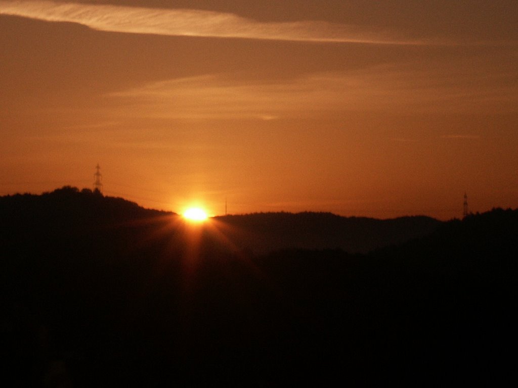 The sun cames at the morning over the hills near the town eibach by eos1