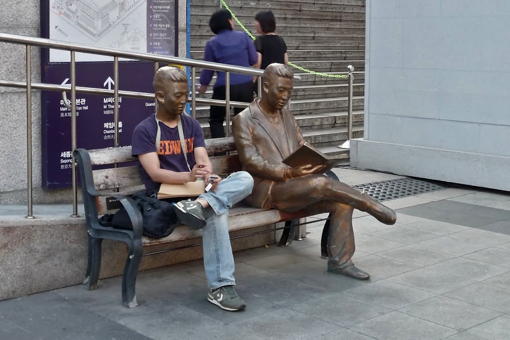 Reading, now and then... (at the Sejong Center) by df3vi