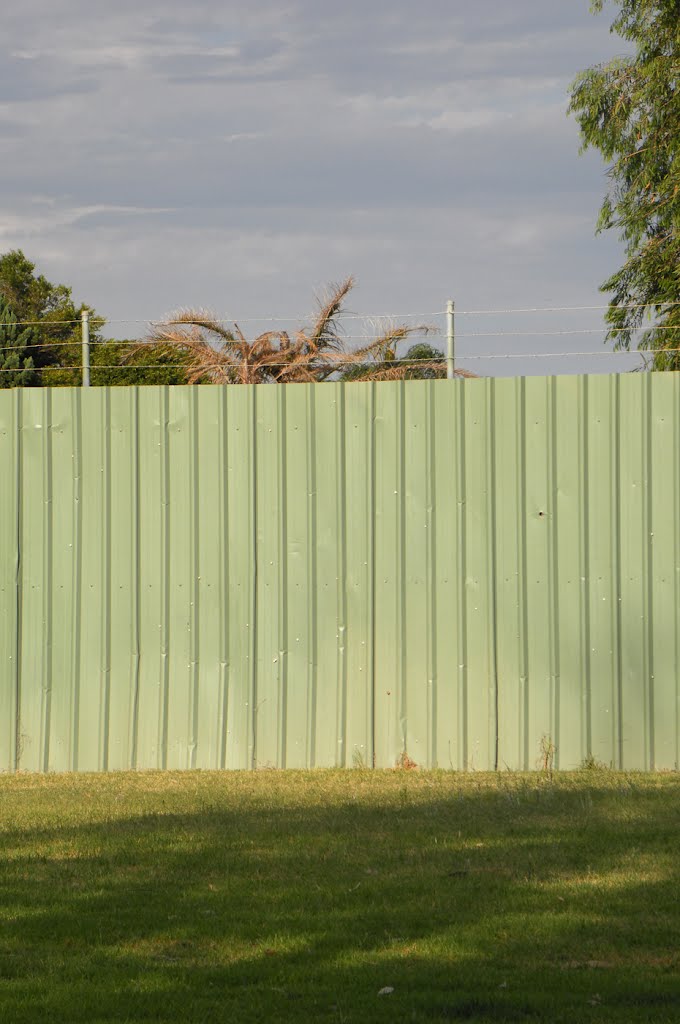 Another sewage pit, this one has barbed wire by Dylan Hewson