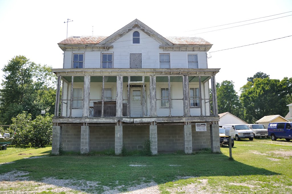 VIRGINIA: POQUOSON: classic private residence jacked up and given new foundation to avoid flooding on Poquoson Avenue by Douglas W. Reynolds, Jr.