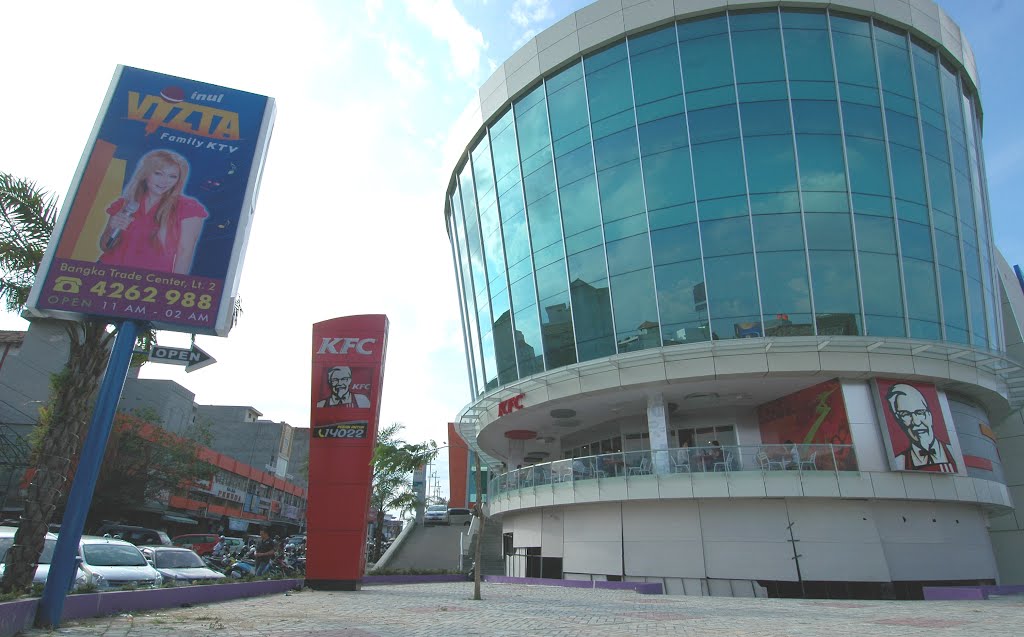 In front of KFC at a corner of what used to be Toko Bangunan by Edik Panjaitan