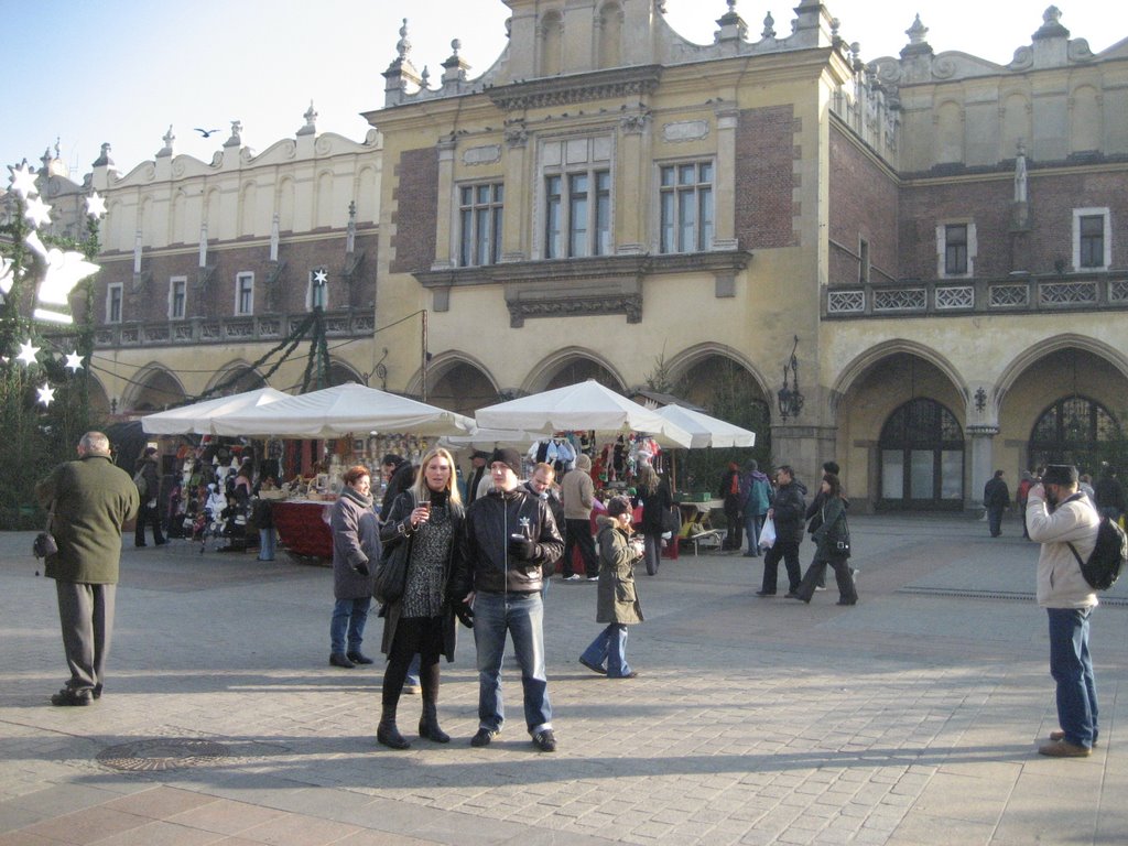 KRAKOW. Christmas market in front of Sukiennice by Mike Zawadzki