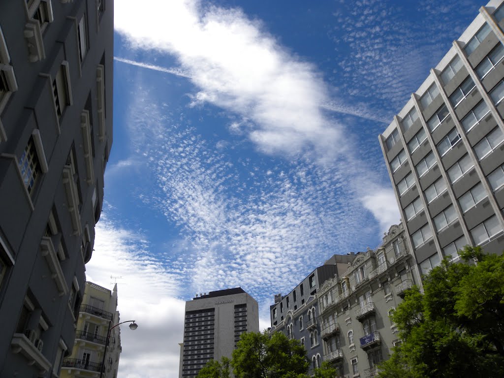 Cloud patterns over Lisbon 1 by Miguel Bortfeldt