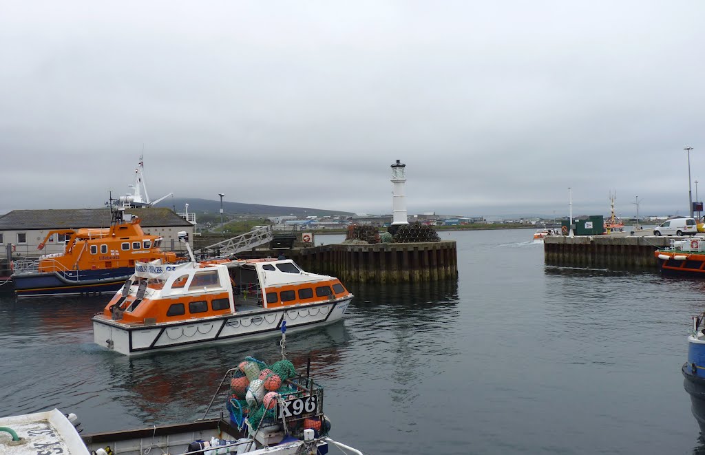 Kirkwall Inner Harbour with Light at Entrance, Orkney Islands, Scotland, UK by Joseph Hollick