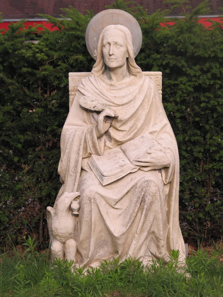 Statue of a saint at the cemetery of the Sint Jozefkerk by Willem Nabuurs