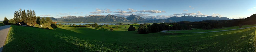 Panoramic View at the Alpes with the Forggensee at Sunset by fridtjof.stein