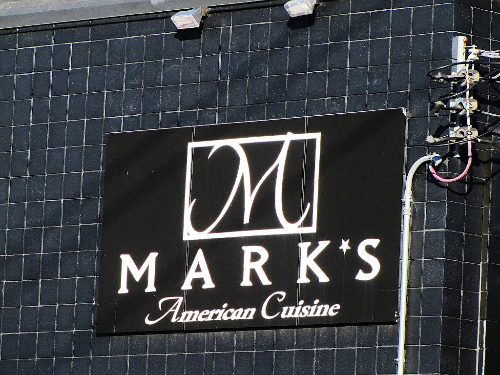 Mark's American Cuisine (signage on building) by Wolfgang Houston