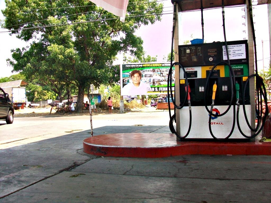 Total Gas Station by Florante