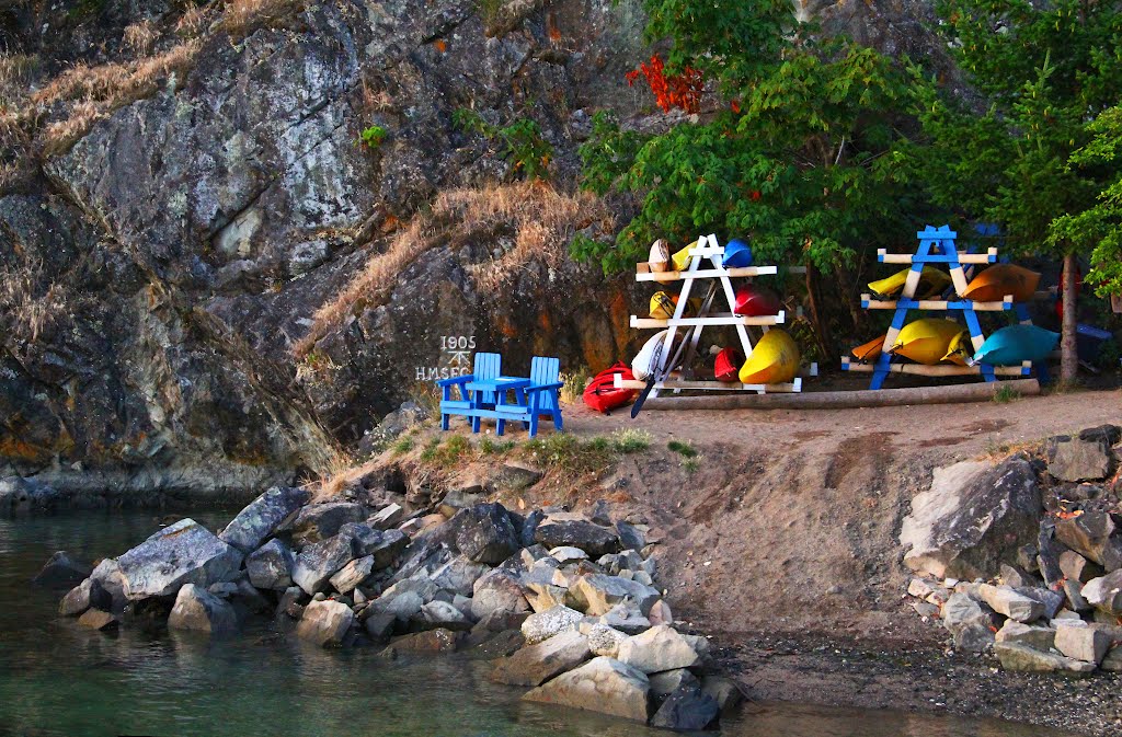 Colorful Kayaks and a 1905 Survey Marker by CapnLance