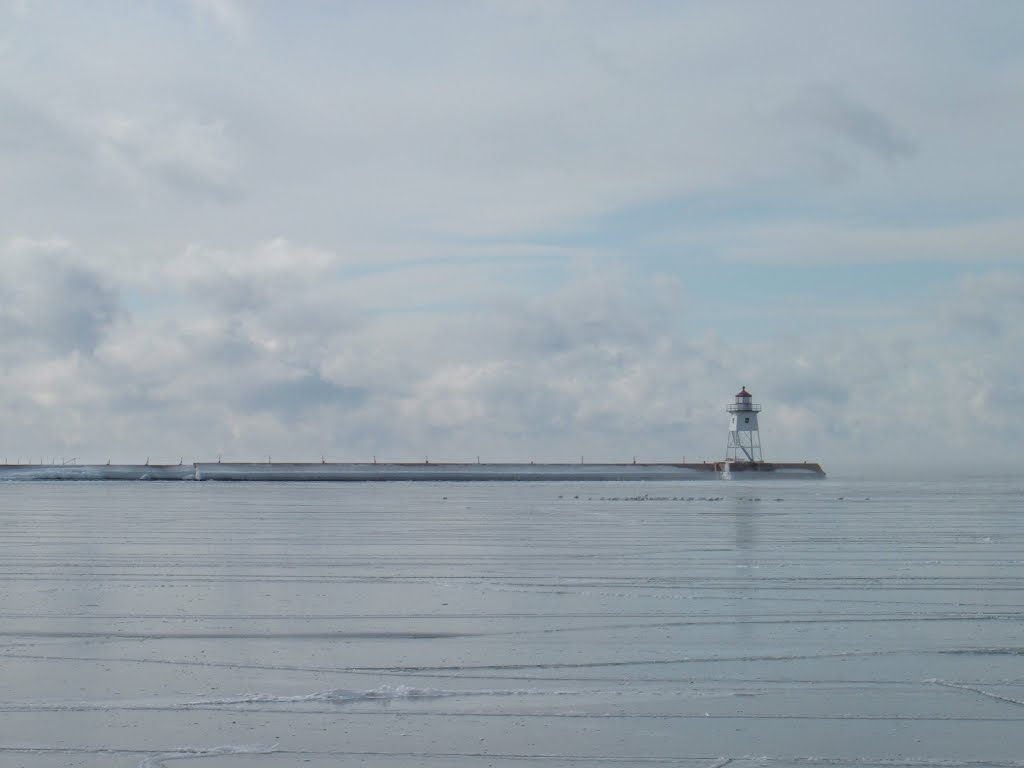 Feb 2006 - Grand Marais, Minnesota. Frozen Grand Marais Harbor. by BRIAN ZINNEL