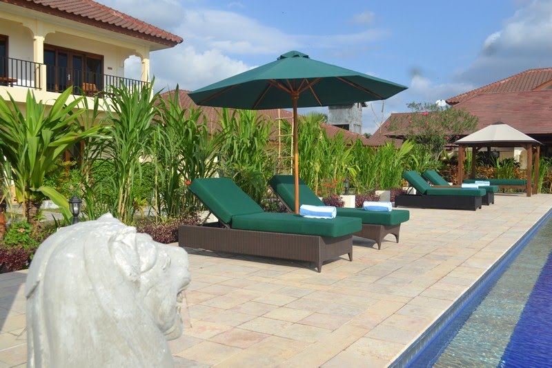 Sunbathing at manna beach villa by Heru Minandar, ST.