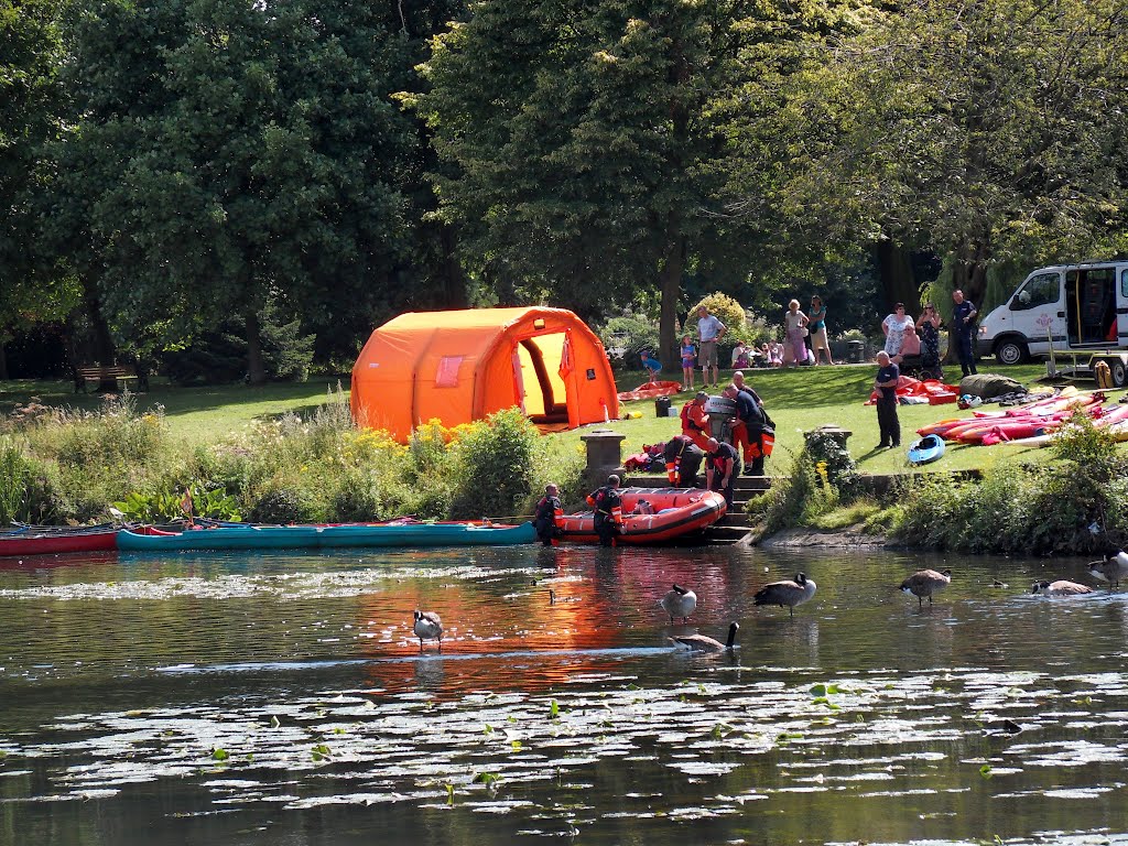 The rescue services practice in the shallow waters at Abbey park on a hot Summers day. by Bobsky.